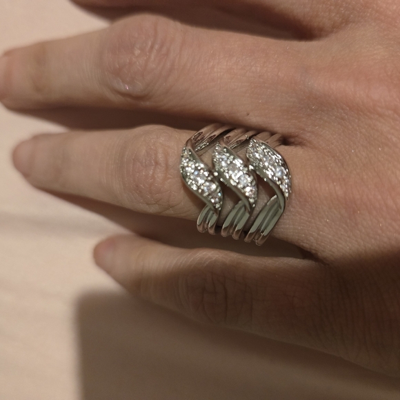 Silver and White Twisting Diamond Ring - Picture 1 of 7